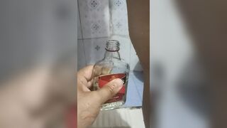 Bhabi pissing in rum bottle